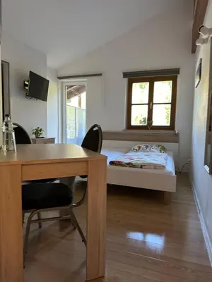 Ein Bett oder Betten in einem Zimmer der Unterkunft Manthaler