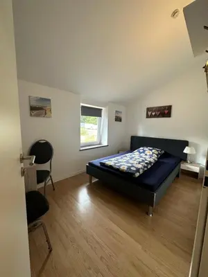 Ein Bett oder Betten in einem Zimmer der Unterkunft Manthaler