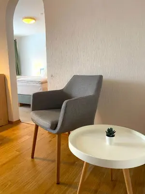 Ein Sitzbereich in der Unterkunft Apartmenthaus am Tegernsee - Studios mit Küchenzeile und mit Bus erreichbar