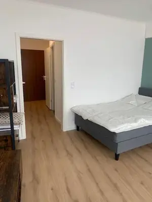 Ein Bett oder Betten in einem Zimmer der Unterkunft Sky Apartment im Hotelturm