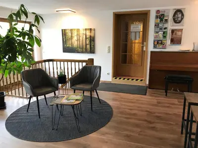 Ein Sitzbereich in der Unterkunft Abendruhe Hotel - kontaktloser Check In