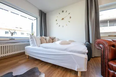 Ein Bett oder Betten in einem Zimmer der Unterkunft Alpenglück