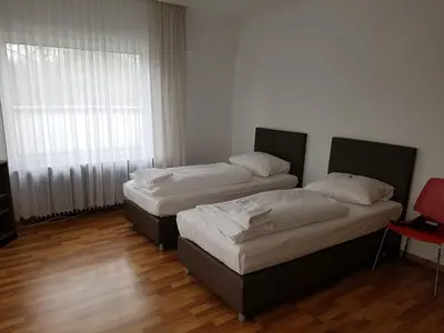 Ein Bett oder Betten in einem Zimmer der Unterkunft Hotel Pegasus
