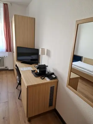 Ein Bett oder Betten in einem Zimmer der Unterkunft Hotel Pegasus