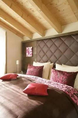 Ein Bett oder Betten in einem Zimmer der Unterkunft Hotel Maximilian