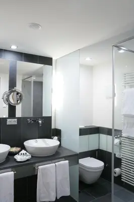 Ein Badezimmer in der Unterkunft Hotel Maximilian