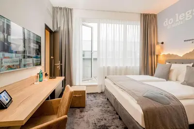 Ein Bett oder Betten in einem Zimmer der Unterkunft Best Western Hotel Arabellapark Muenchen