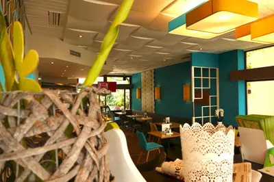 Ein Restaurant oder anderes Speiselokal in der Unterkunft Hasi's Hotel