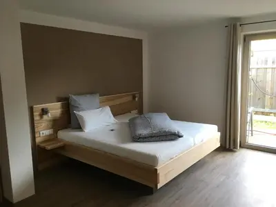 Ein Bett oder Betten in einem Zimmer der Unterkunft Gaestehaus Richter