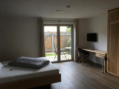Ein Bett oder Betten in einem Zimmer der Unterkunft Gaestehaus Richter