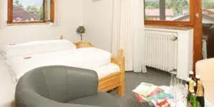 Ein Bett oder Betten in einem Zimmer der Unterkunft Gaestehaus Richter
