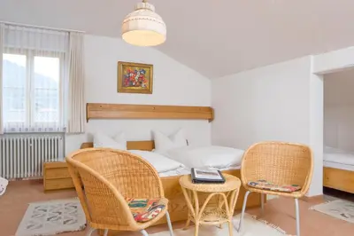 Ein Sitzbereich in der Unterkunft Gaestehaus Richter