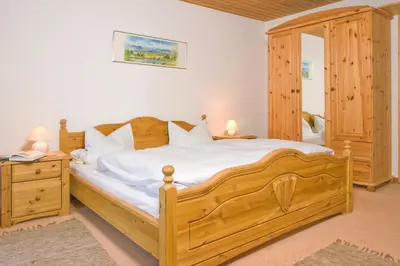 Ein Bett oder Betten in einem Zimmer der Unterkunft Gaestehaus Richter