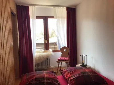 Ein Bett oder Betten in einem Zimmer der Unterkunft Alpendomizil Reber 2