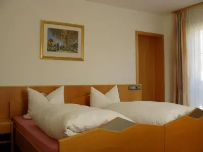 Ein Bett oder Betten in einem Zimmer der Unterkunft Pension Demmel, Bed & Breakfast