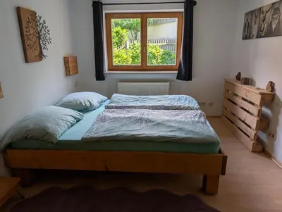 Ein Bett oder Betten in einem Zimmer der Unterkunft Ferienwohnung Hofheinz