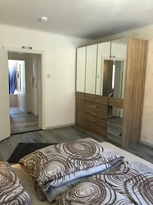 Ein Bett oder Betten in einem Zimmer der Unterkunft Augsburg City nah am Hofgarten