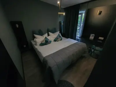 Ein Bett oder Betten in einem Zimmer der Unterkunft Hotel Falkenturm