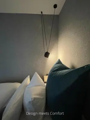 Ein Bett oder Betten in einem Zimmer der Unterkunft Hotel Falkenturm