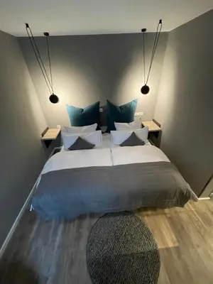 Ein Bett oder Betten in einem Zimmer der Unterkunft Hotel Falkenturm