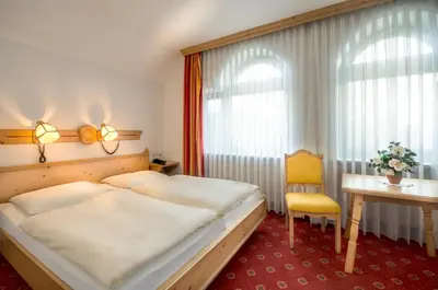 Ein Bett oder Betten in einem Zimmer der Unterkunft Hotel Gasthof zur Post