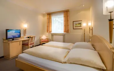 Ein Bett oder Betten in einem Zimmer der Unterkunft Hotel Gasthof zur Post