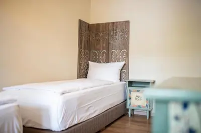 Ein Bett oder Betten in einem Zimmer der Unterkunft Haus Ludwig Murmeltier