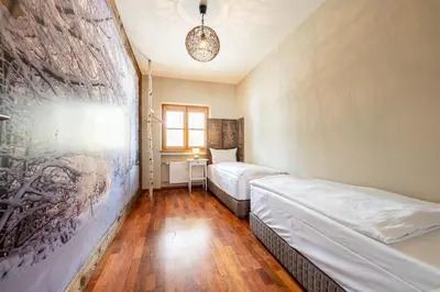 Ein Bett oder Betten in einem Zimmer der Unterkunft Haus Ludwig Steinwild