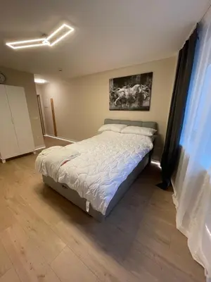 Ein Bett oder Betten in einem Zimmer der Unterkunft Apartment an der Stadtmauer by Aux Property