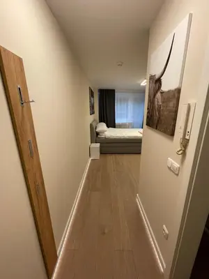 Ein Bett oder Betten in einem Zimmer der Unterkunft Apartment an der Stadtmauer by Aux Property