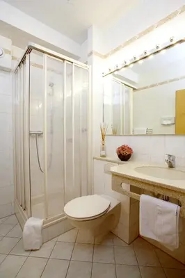 Ein Badezimmer in der Unterkunft Hotel Grünwald