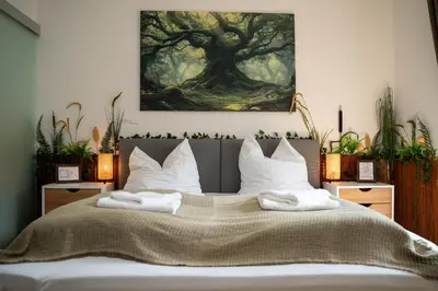 Ein Bett oder Betten in einem Zimmer der Unterkunft WuhrsteinHaus, Heil- und Seminarzentrum Chiemgau