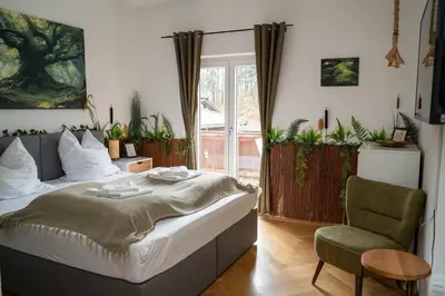 Ein Bett oder Betten in einem Zimmer der Unterkunft WuhrsteinHaus, Heil- und Seminarzentrum Chiemgau