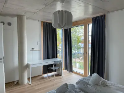 Ein Bett oder Betten in einem Zimmer der Unterkunft Int. Appartment Kolbermoor