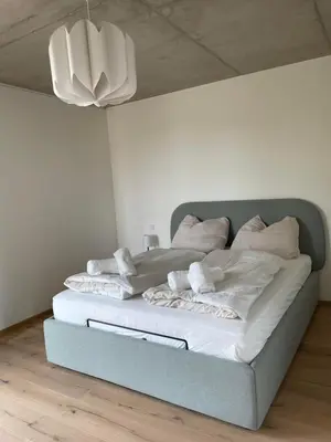 Ein Bett oder Betten in einem Zimmer der Unterkunft Int. Appartment Kolbermoor