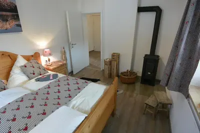 Ein Bett oder Betten in einem Zimmer der Unterkunft Ferienwohnung Viererspitzblick
