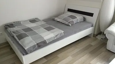 Ein Bett oder Betten in einem Zimmer der Unterkunft München Waldperlach ruhig und sehr schöne Wohnung