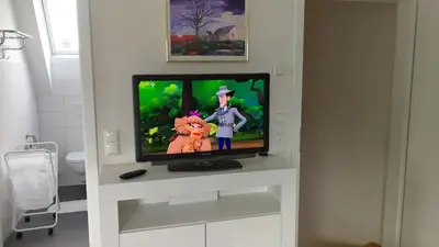 TV/Unterhaltungsangebot in der Unterkunft München Waldperlach ruhig und sehr schöne Wohnung