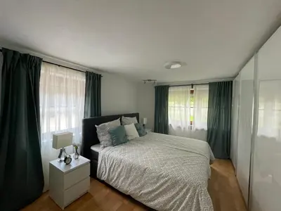 Ein Bett oder Betten in einem Zimmer der Unterkunft Ferienwohnung Siglreitmaier 2