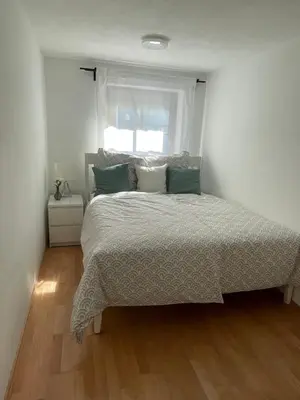 Ein Bett oder Betten in einem Zimmer der Unterkunft Ferienwohnung Siglreitmaier 2