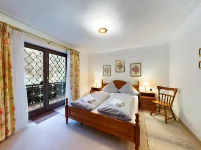 Ein Bett oder Betten in einem Zimmer der Unterkunft Alpspitz-Flair