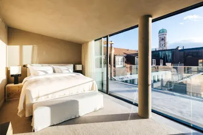 Ein Bett oder Betten in einem Zimmer der Unterkunft Hotel Bayerischer Hof