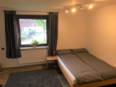 Ein Bett oder Betten in einem Zimmer der Unterkunft Komfort Wohn- und Ferienhaus JAKOBI