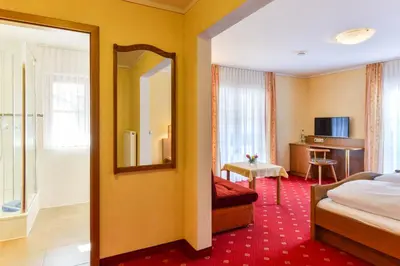 Ein Bett oder Betten in einem Zimmer der Unterkunft Gasthof Mühlwinkl