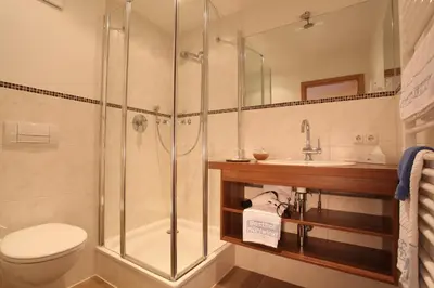 Ein Badezimmer in der Unterkunft Gasthof Mühlwinkl
