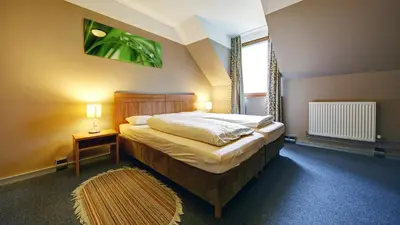 Ein Bett oder Betten in einem Zimmer der Unterkunft Gasthaus Mooshäusl