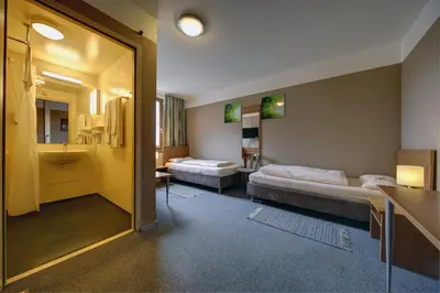 Ein Bett oder Betten in einem Zimmer der Unterkunft Gasthaus Mooshäusl