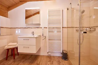 Ein Badezimmer in der Unterkunft Appartements Gasthof Schleifmühle Unterammergau