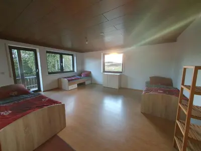 Ein Bett oder Betten in einem Zimmer der Unterkunft Pension Heller