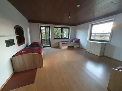 Ein Bett oder Betten in einem Zimmer der Unterkunft Pension Heller